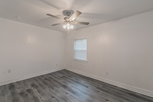 unfurnished room featuring ceiling fan and dark hardwood / wood-style floors