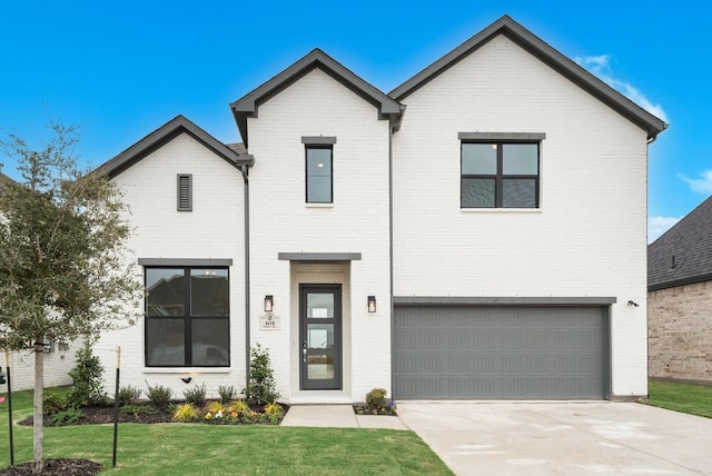 modern farmhouse style home with a front yard and a garage