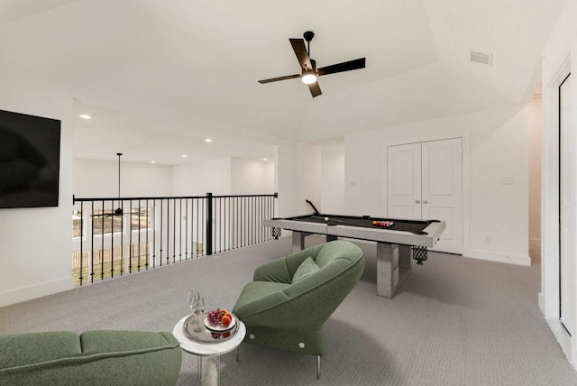 recreation room featuring light carpet and ceiling fan