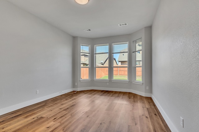 empty room featuring light hardwood / wood-style floors