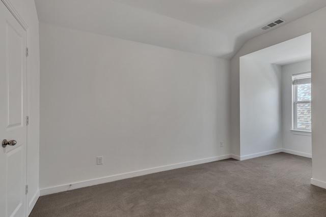 14924 Nightmist Rd, Aledo, TX 76008 - spare room featuring dark carpet, baseboards, and lofted ceiling