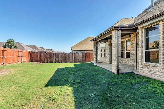 view of yard with a patio area