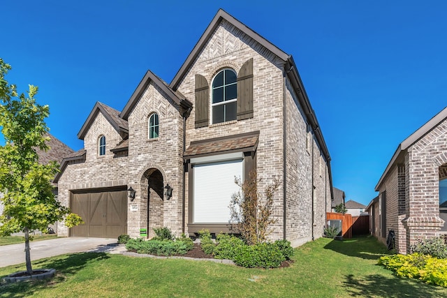 french country inspired facade with a garage and a front lawn