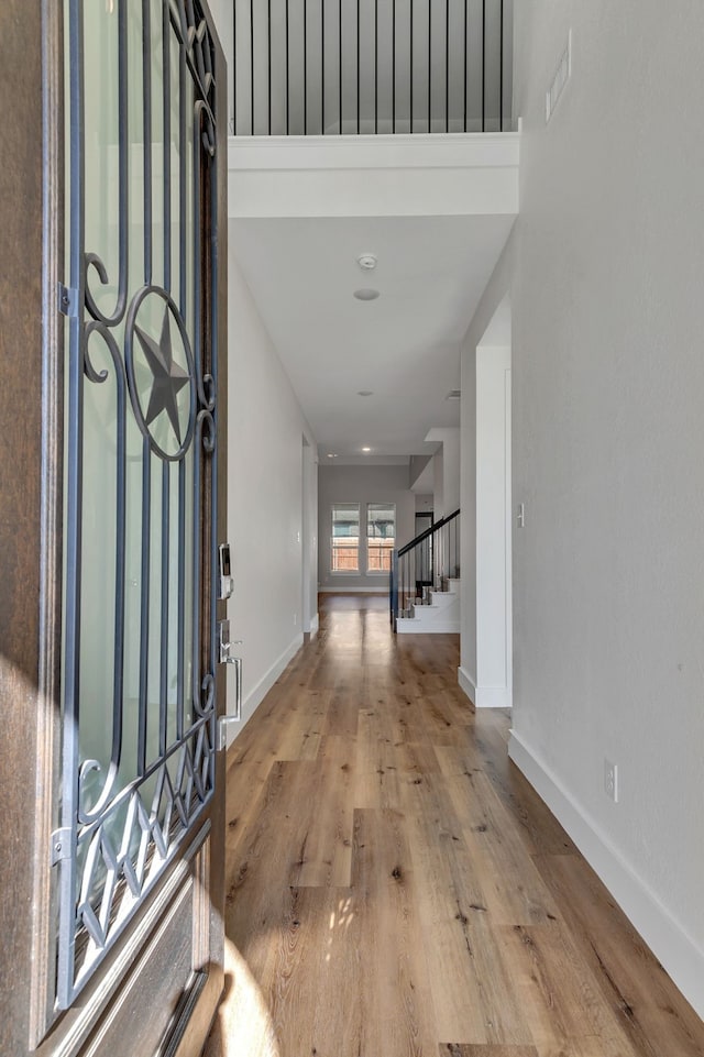 foyer entrance featuring light hardwood / wood-style flooring