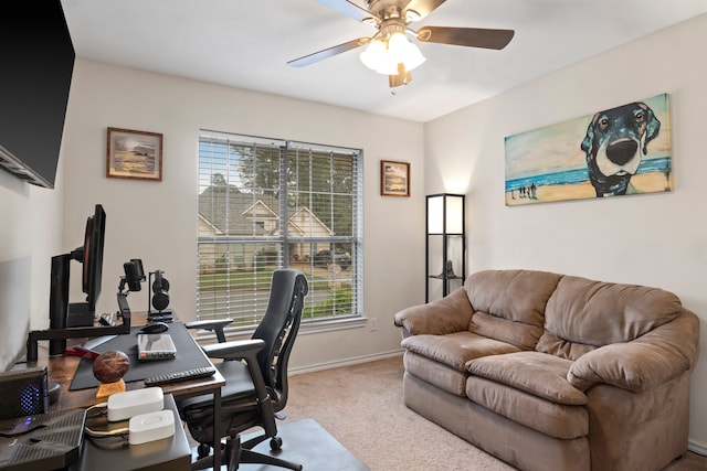 office space with light colored carpet and ceiling fan