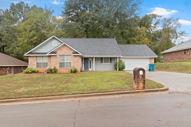 view of front facade featuring a garage and a front yard