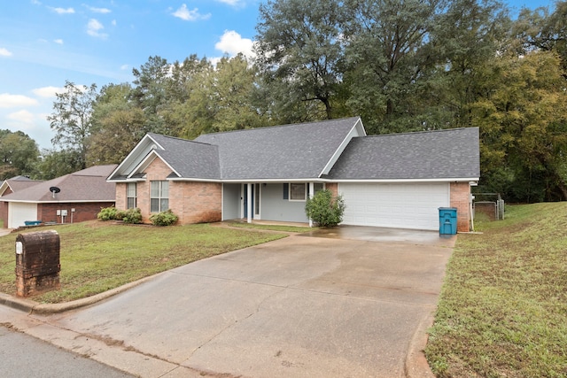 ranch-style house featuring a garage and a front lawn