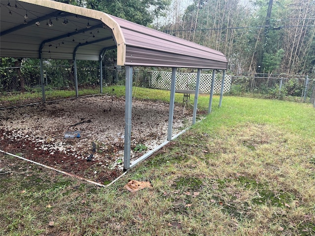 view of yard with a carport