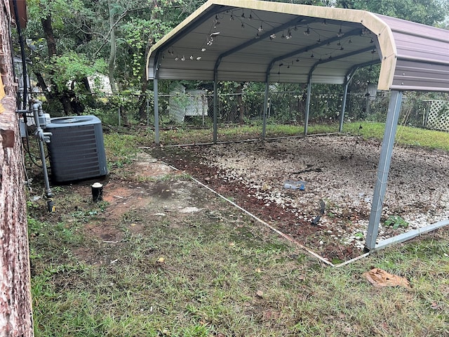 view of vehicle parking featuring a carport