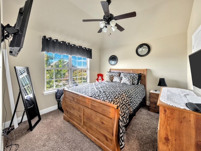 carpeted bedroom with ceiling fan and lofted ceiling