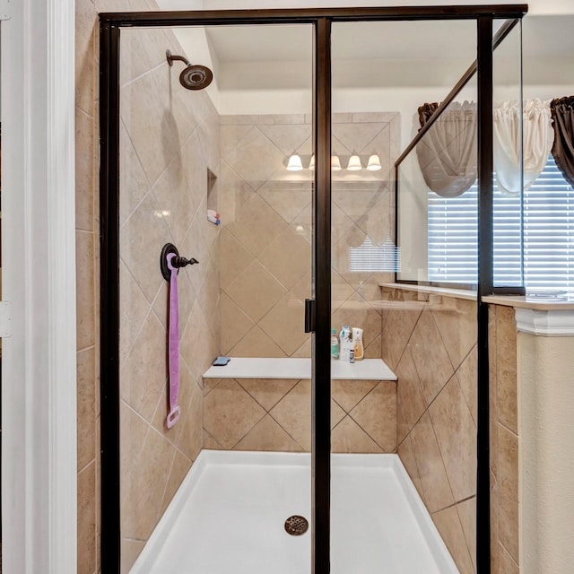 bathroom featuring walk in shower