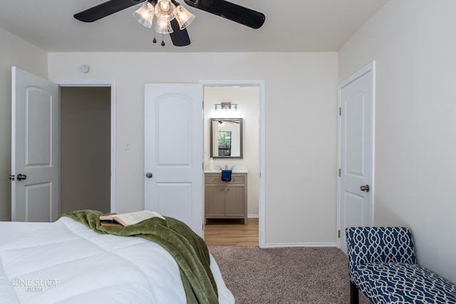 bedroom featuring ceiling fan, connected bathroom, and carpet