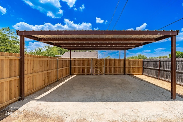 view of car parking with a carport