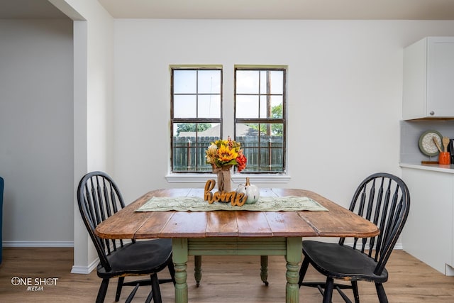 dining room featuring light wood-type flooring