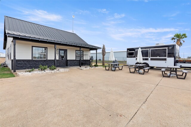 surrounding community featuring a patio