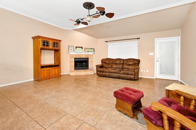 tiled living room featuring ceiling fan, crown molding, and lofted ceiling