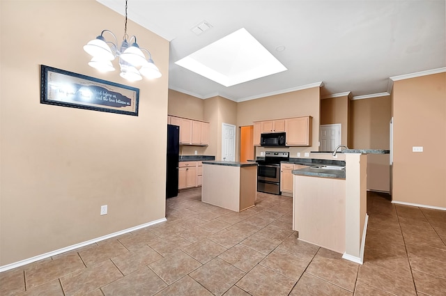 kitchen with black appliances, decorative light fixtures, a center island with sink, and crown molding