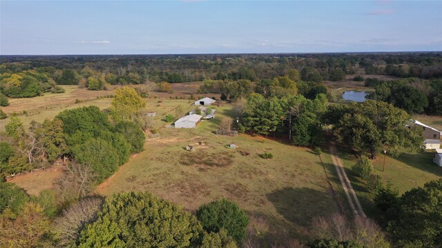 drone / aerial view featuring a water view and a rural view