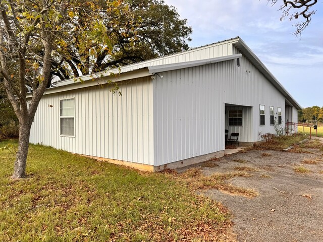 view of property exterior featuring a yard