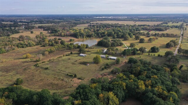 aerial view with a water view and a rural view