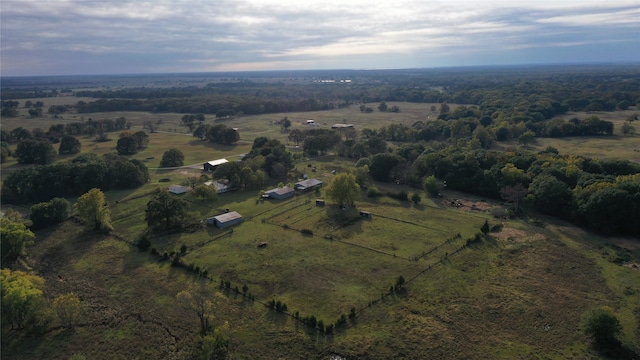 birds eye view of property featuring a rural view