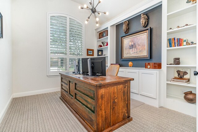 carpeted office space featuring built in features and a chandelier