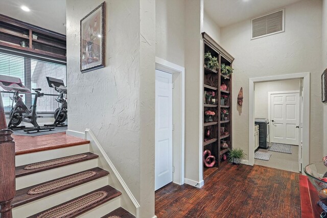 hallway featuring dark hardwood / wood-style flooring