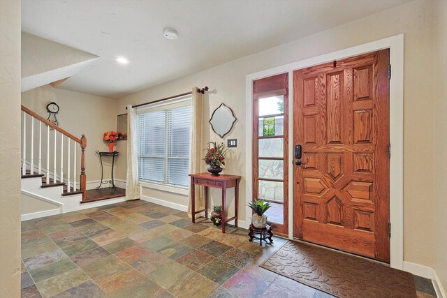 hallway with dark hardwood / wood-style floors