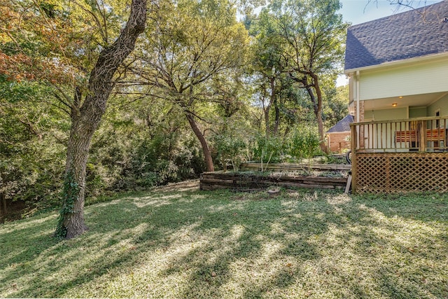 view of yard with a deck