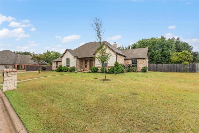 view of front of home with a front lawn