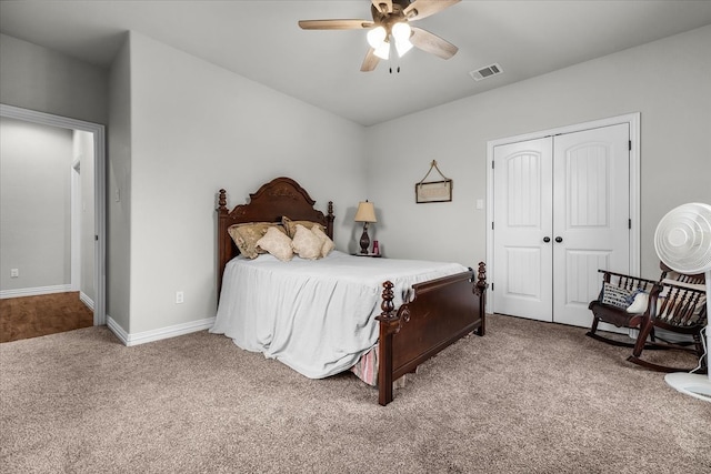 bedroom featuring carpet floors, ceiling fan, and a closet