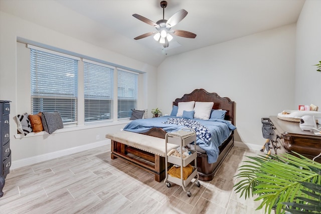 bedroom featuring vaulted ceiling and ceiling fan