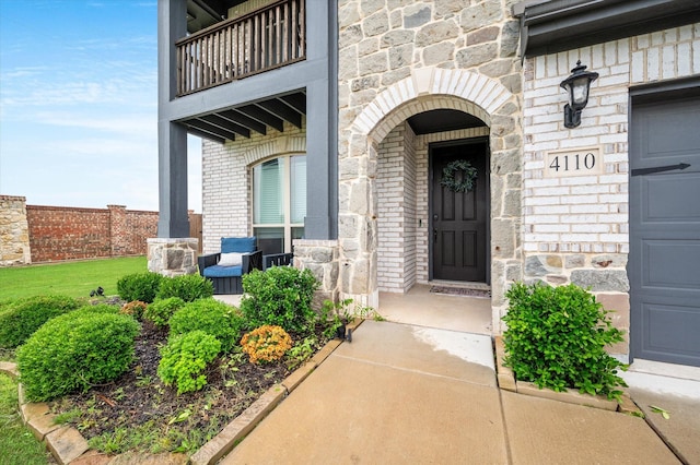 property entrance with a balcony