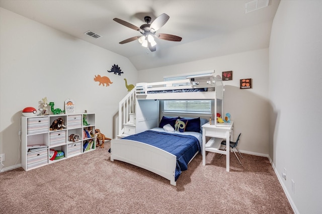 carpeted bedroom featuring vaulted ceiling and ceiling fan