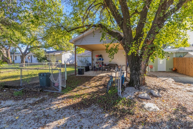 view of yard with a carport