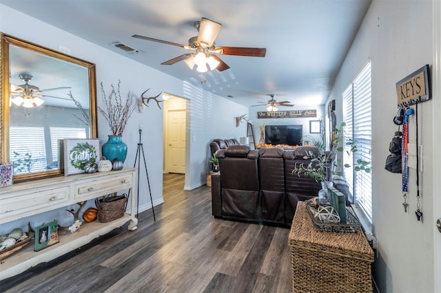 living room with dark hardwood / wood-style floors