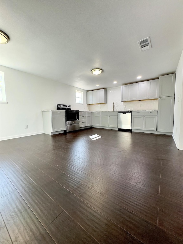 interior space with sink and dark wood-type flooring