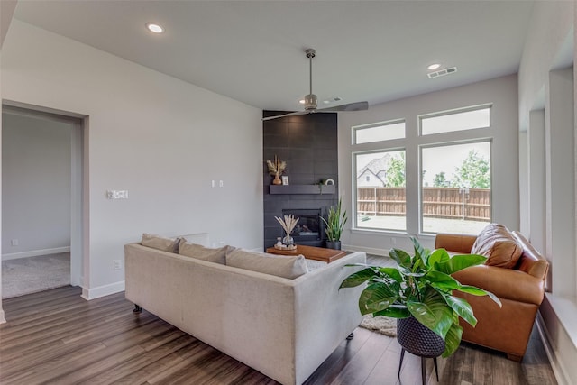 4104 Dartmoor Dr, Aubrey, TX 76227 - living room featuring a large fireplace, wood finished floors, baseboards, a ceiling fan, and recessed lighting