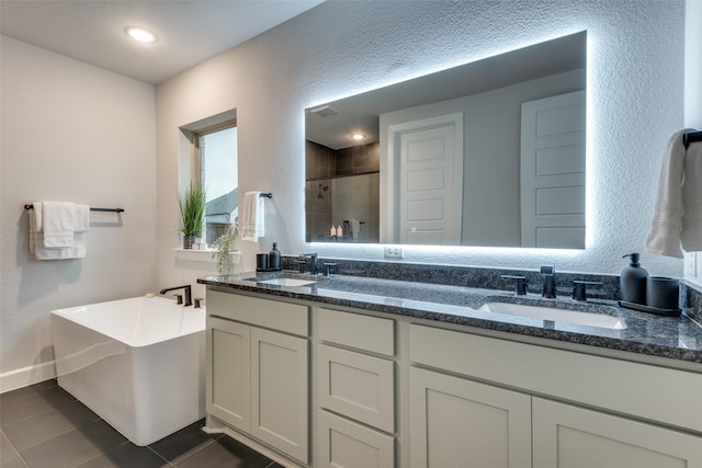 bathroom with vanity, separate shower and tub, and tile patterned flooring