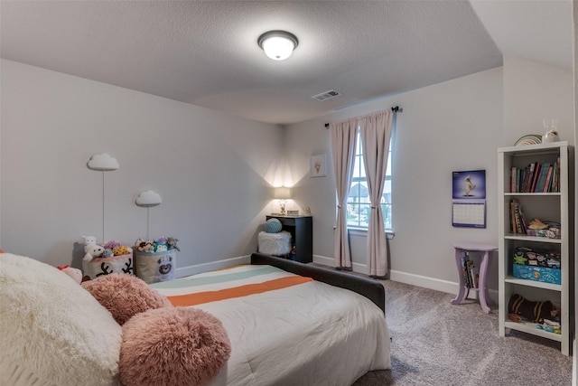 4104 Dartmoor Dr, Aubrey, TX 76227 - carpeted bedroom featuring a textured ceiling and baseboards