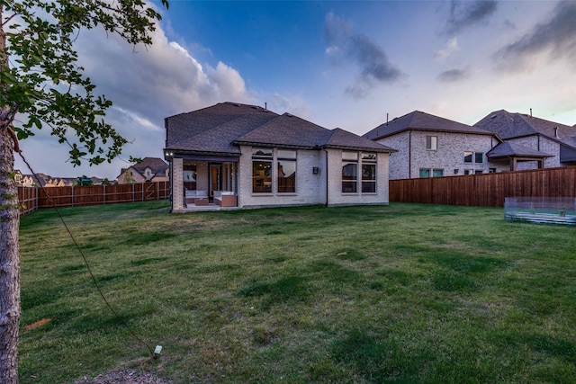 4104 Dartmoor Dr, Aubrey, TX 76227 - rear view of property with a patio area, brick siding, and a shingled roof