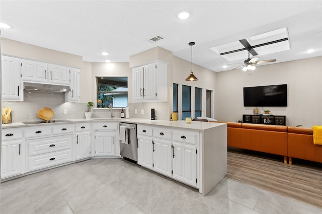 kitchen featuring kitchen peninsula, stainless steel dishwasher, ceiling fan, pendant lighting, and white cabinetry