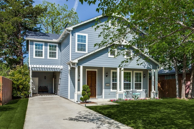 view of front facade with covered porch and a front lawn