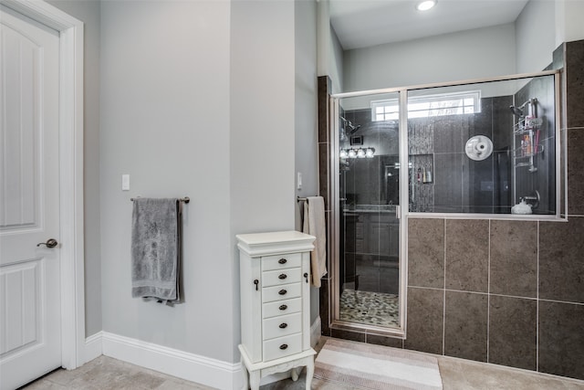 bedroom with dark wood-type flooring, a tray ceiling, french doors, and access to exterior