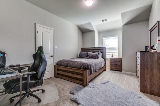 bedroom with light colored carpet