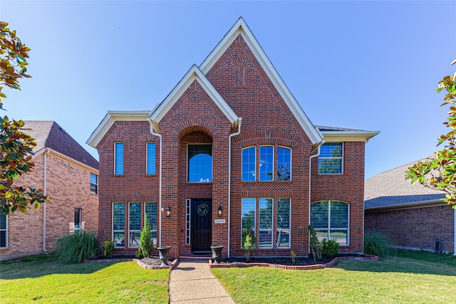 view of front facade with a front lawn