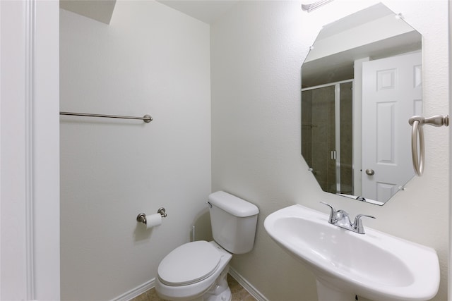 bathroom with sink and toilet