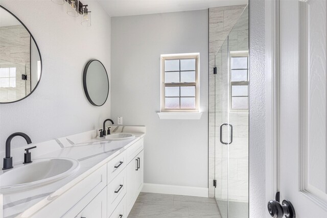 bathroom featuring walk in shower and vanity