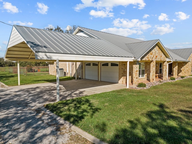 view of front of property with a front lawn and a garage