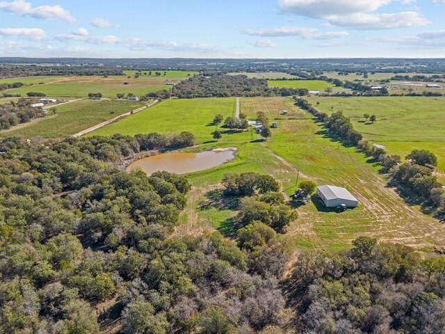 aerial view with a water view and a rural view